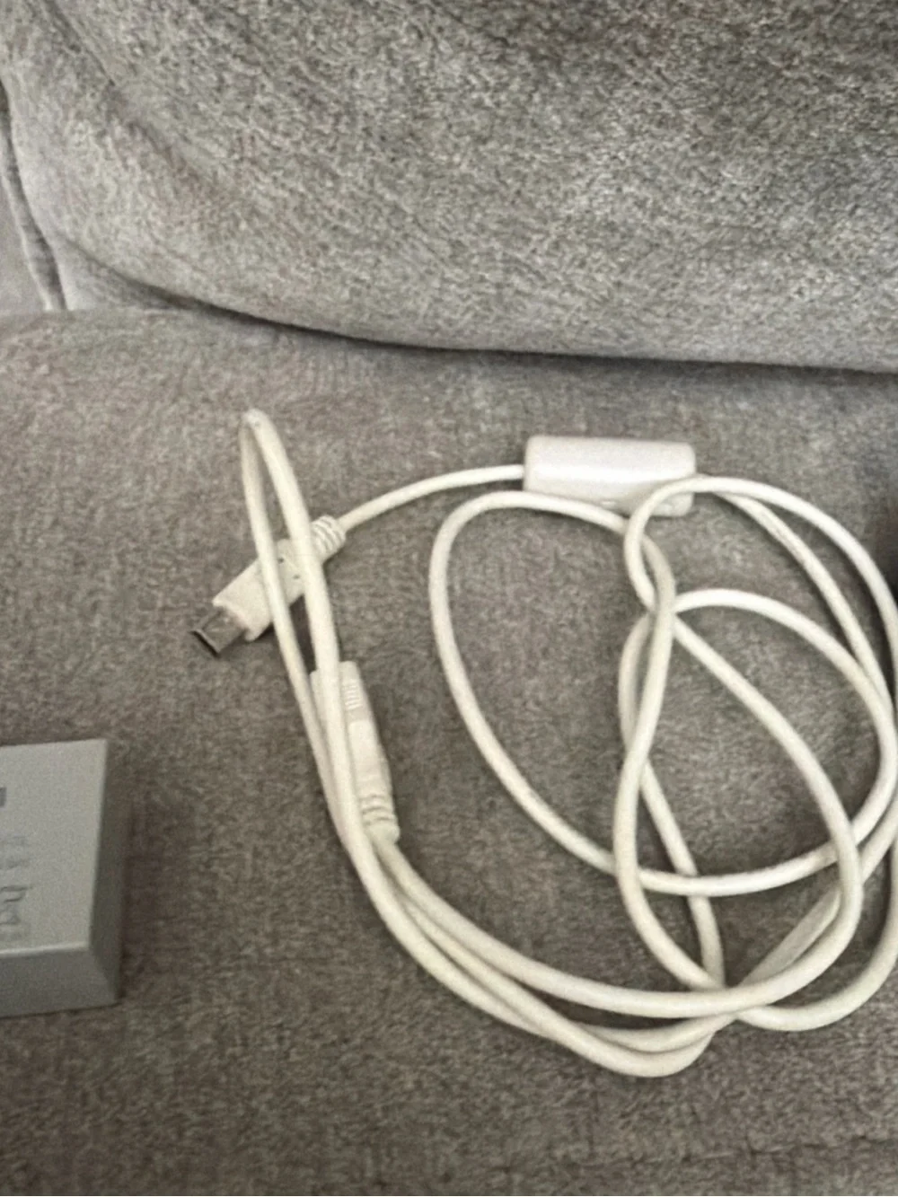 Canon Black Battery Charger with Silver LP-E12 Battery and White USB Cable